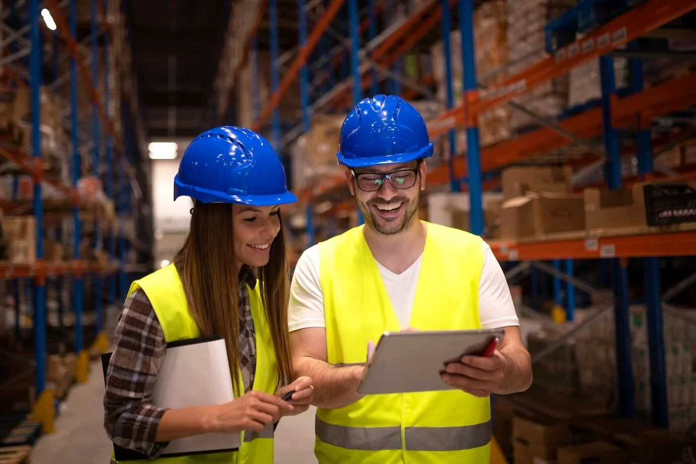 warehouse-workers-checking-shipment-status-tablet-computer-342744-1531